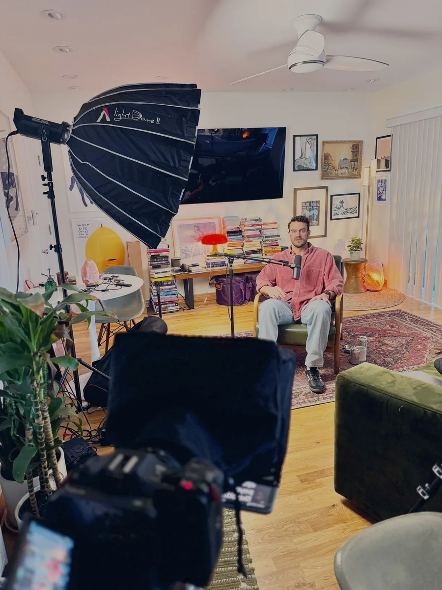 Podcast hosts in conversation on set