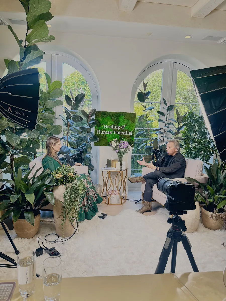 On-location podcast production with greenery set